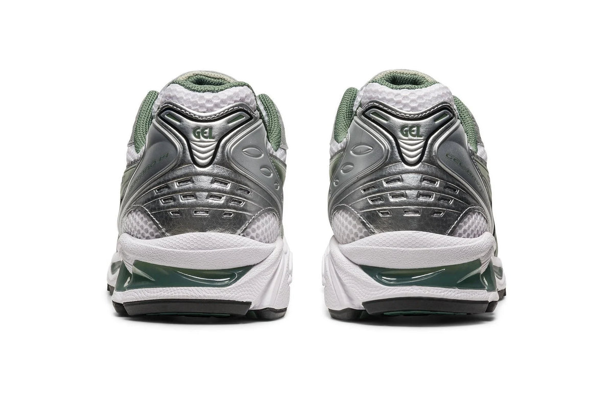 Gel Kayano 14 shoes back view with rear GEL branding and green heel trim in silver