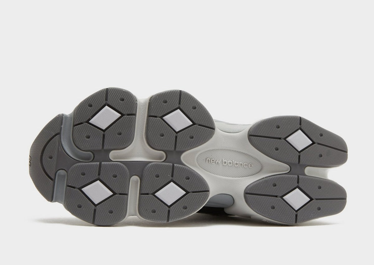 NB 9060 outsole view with grippy rubber tread and “new balance” on midfoot