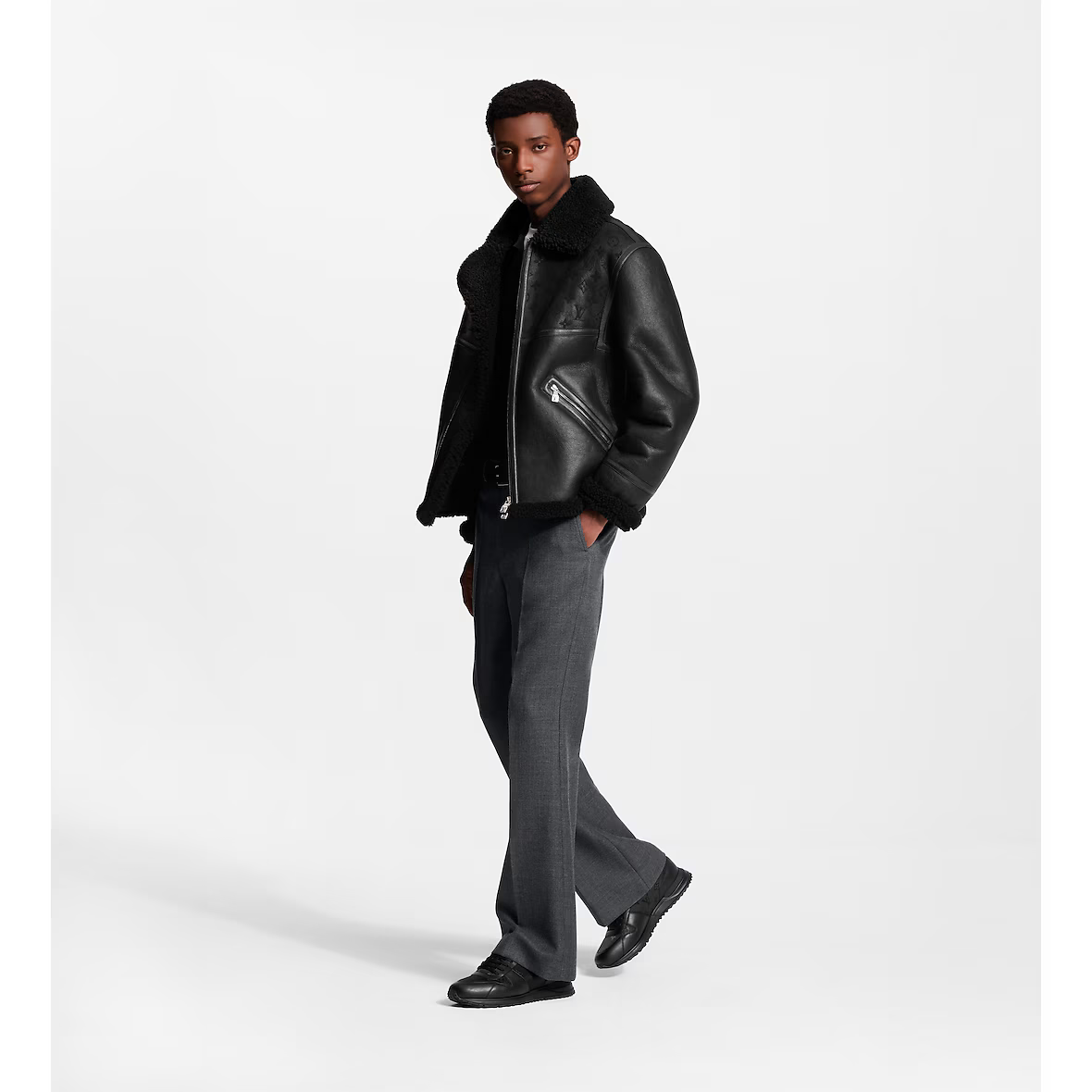 Run Away Sneaker worn with dark pants, black lace-up on chunky tread sole