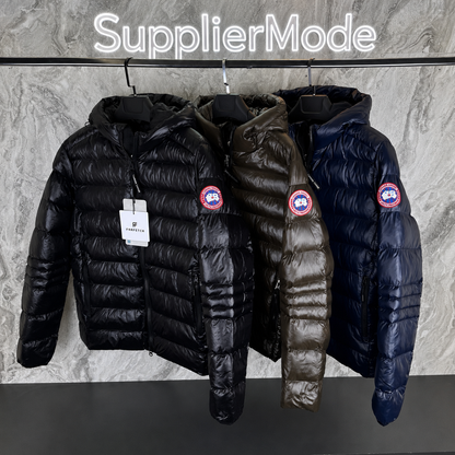 Bubble puffer jackets on a rack: black, olive, and navy with round red logo patches