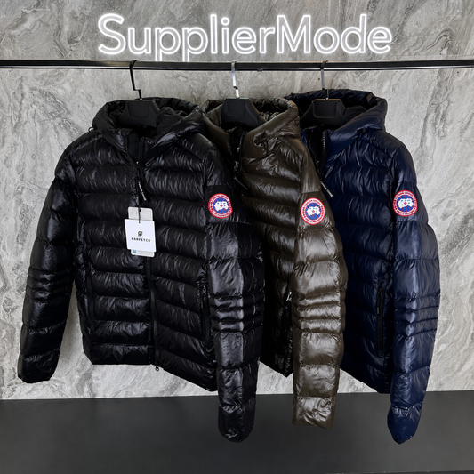 Bubble puffer jackets on a rack: black, olive, and navy with round red logo patches