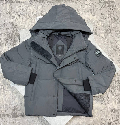 Grey CG coat with hood, button front, chest patch logo, and two front pockets