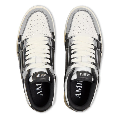 White-and-black low trainers with perforated toe and lace-up front