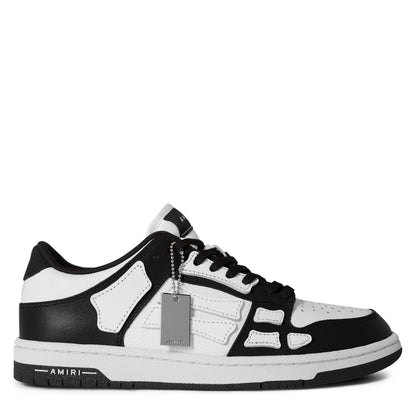 Black-and-white low trainers with lace-up front and side panels