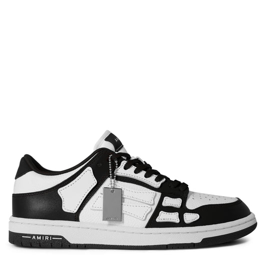 Black-and-white low trainers with lace-up front and side panels