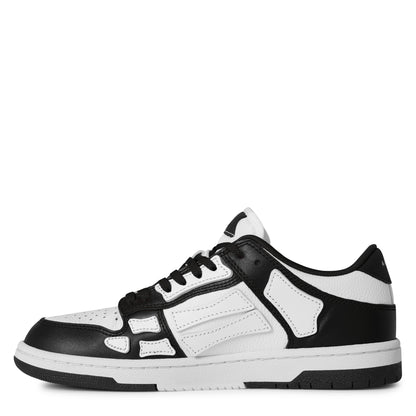 White leather-look low trainers with black side overlays and lace-up