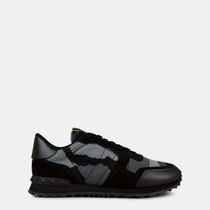 Schwarz-weiße Mesh-Camouflage Rockrunner Sneaker mit Schnürung und dicker Profilsohle