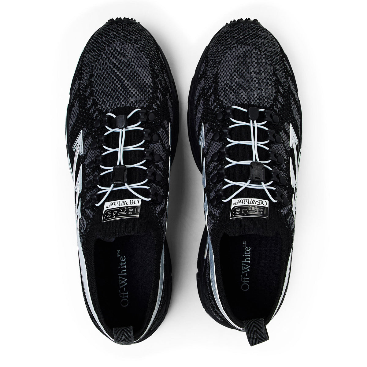 Off White men’s trainers in Black/Silver colorway with white laces and speckled uppers