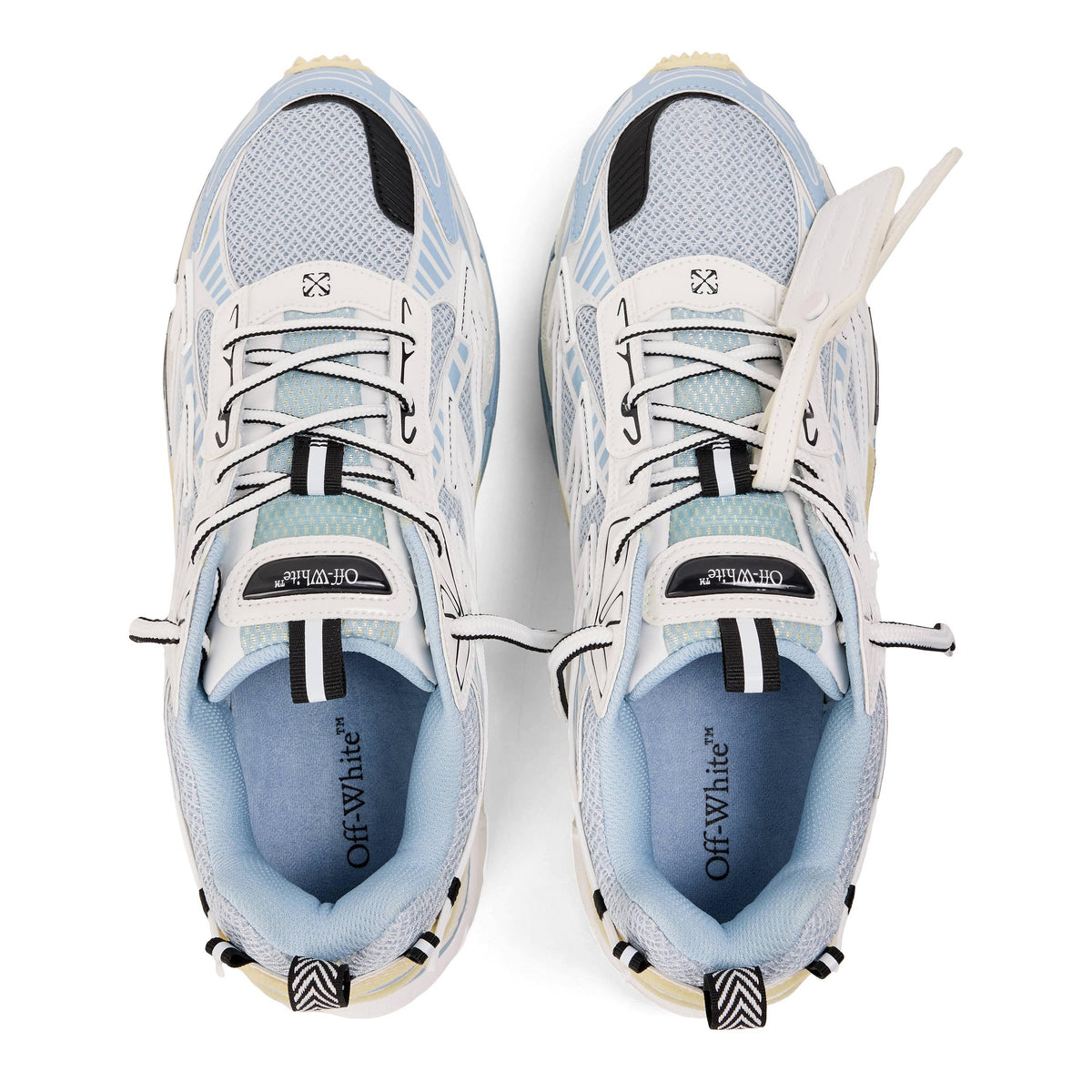 Retro-inspired comfort sneakers in light blue and white with lace-up mesh upper.