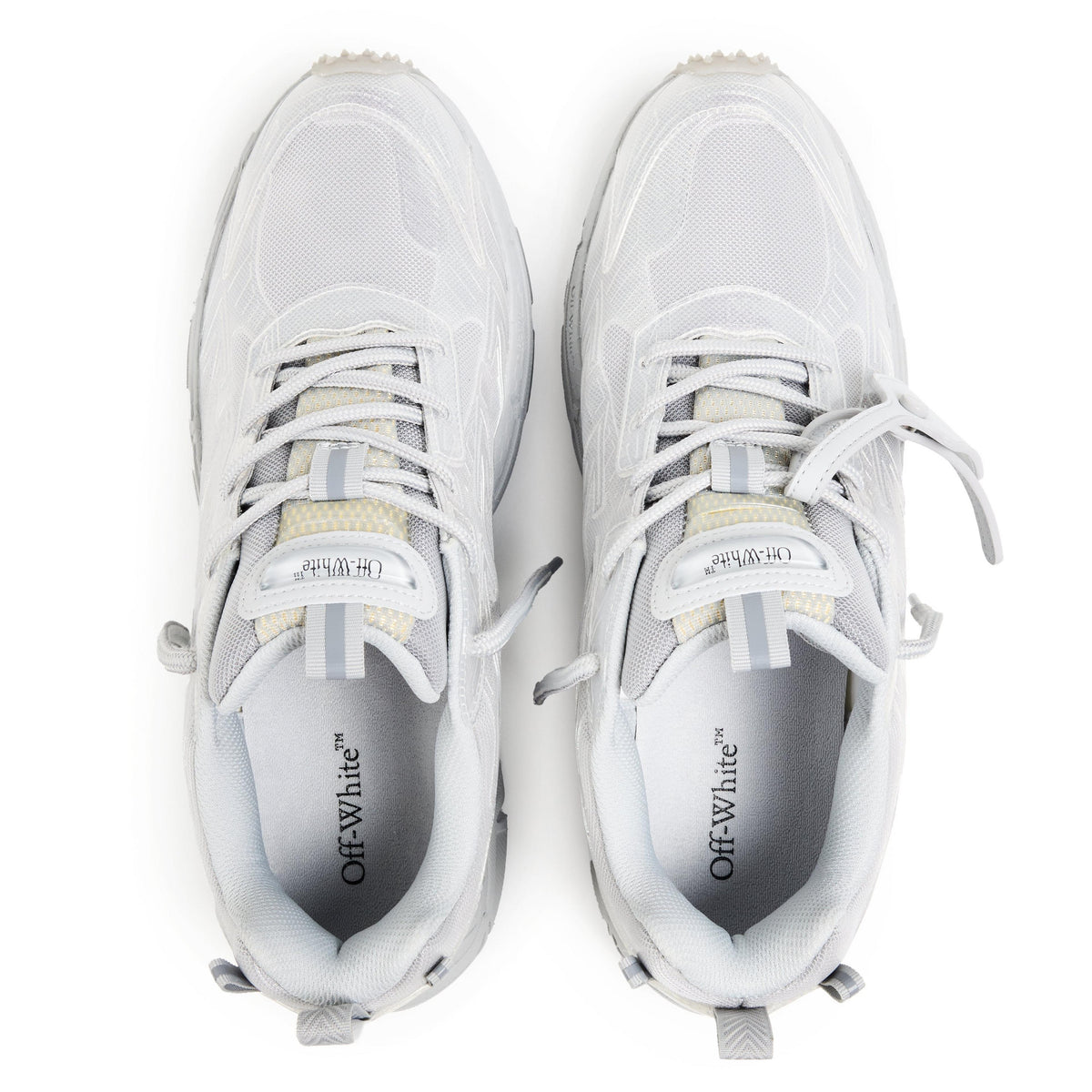 White retro comfort sneakers with breathable mesh upper and white lace-up front.