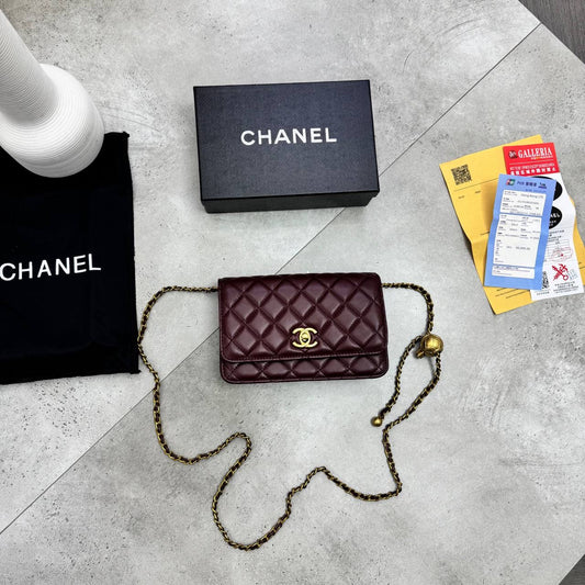 Burgundy quilted CC flap crossbody bag with gold-tone chain strap