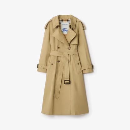 Long gabardine trench coat in sand beige, belted waist, button front and shoulder tabs