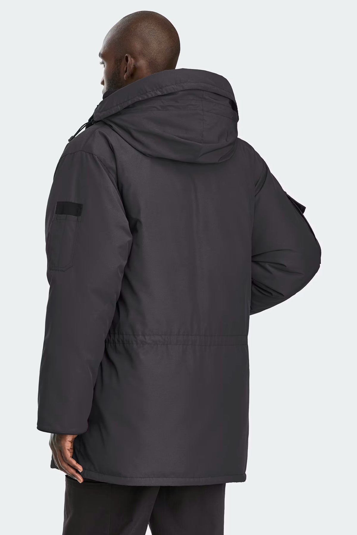 Expedition Parka Black, back view with hood and mid-length insulated parka cut
