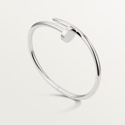 Bracelet jonc clou en argent, fermoir à bouton avec petit clou
