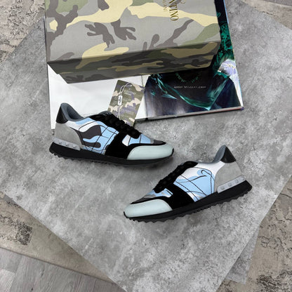 Black and blue Rockrunner sneakers with white accents, lace-up low tops