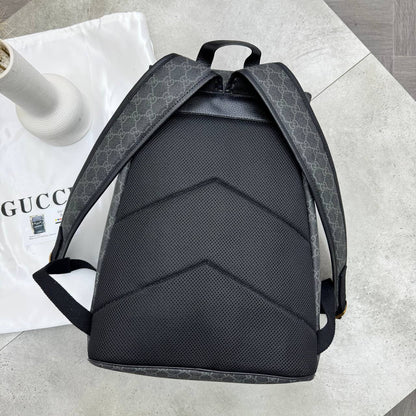Black-and-dark-gray GG backpack with padded back panel and adjustable shoulder straps