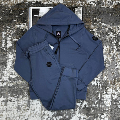 Navy tracksuit set with zip-up hooded jacket and drawstring pants pockets