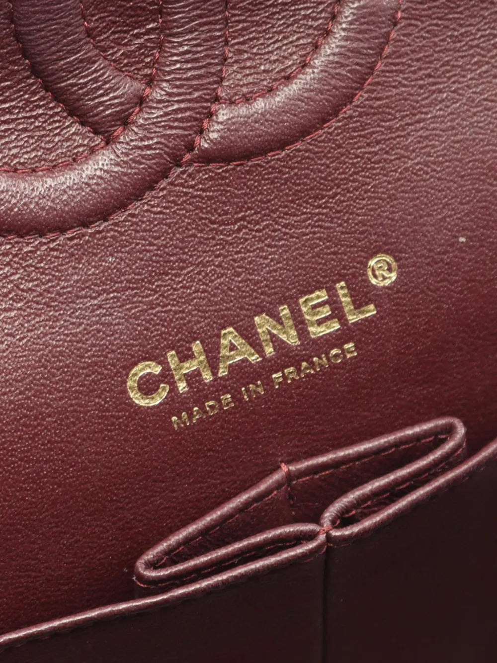 CHANEL MADE IN FRANCE lettering on burgundy lining, close-up