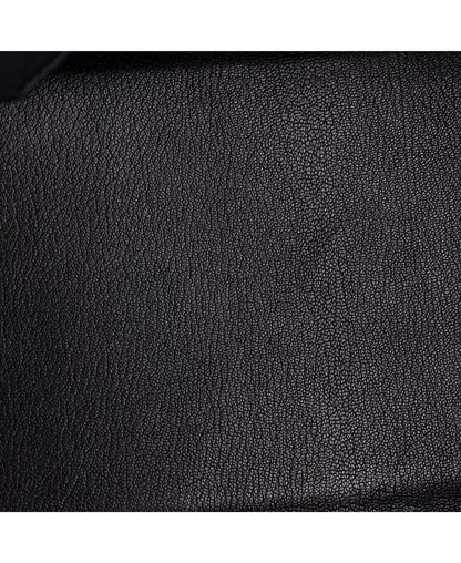 Birkin handbag leather grain close-up, dark pebbled texture