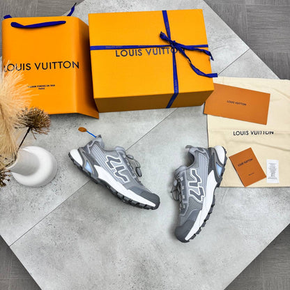 Grey 4LV trainer sneakers with black detailing and lace-up style, 4LV logo.