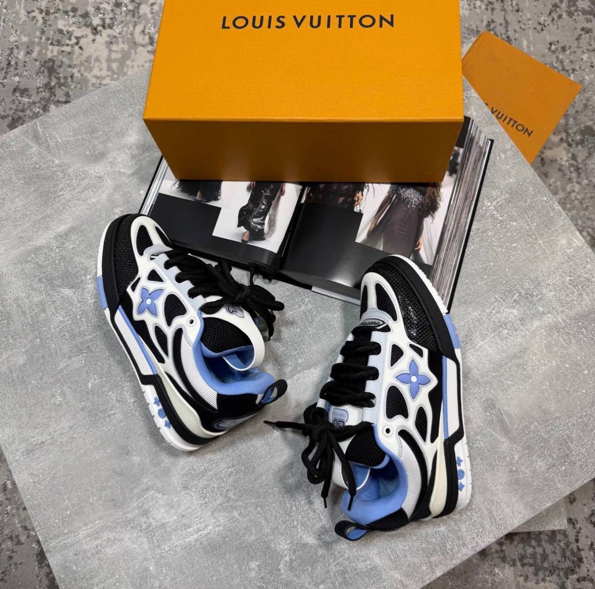 LV skates sneakers, white with blue star accents and black toe, lace-up