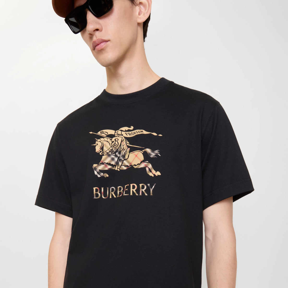 Black cotton T-shirt front view with Burberry horse and crest graphic, crew neck