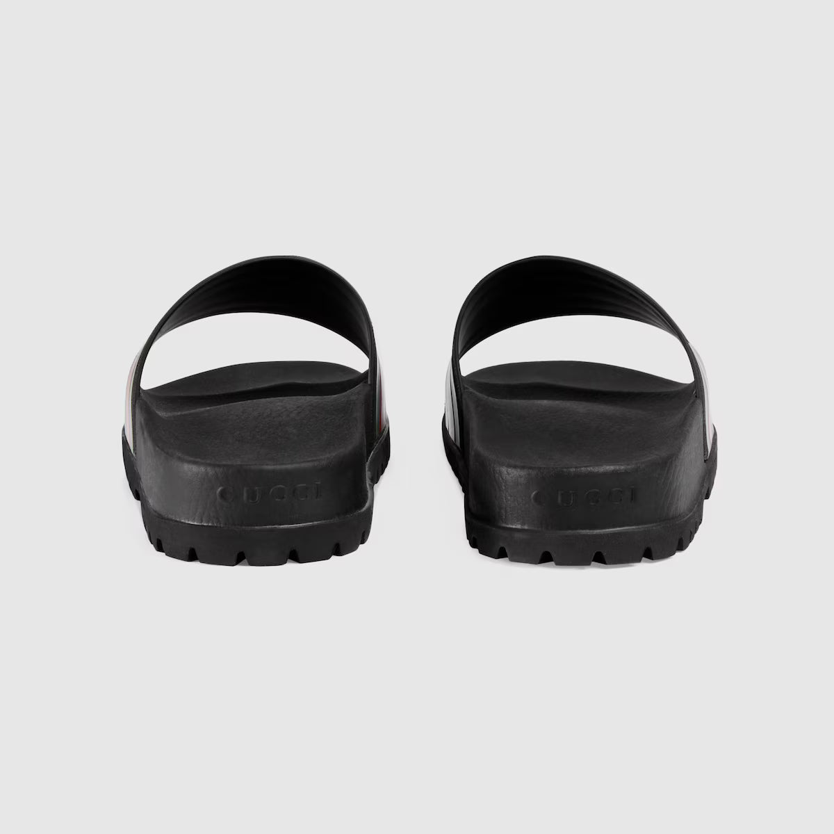 Rubber Web Slide Sandal, rear view: black slide with striped strap