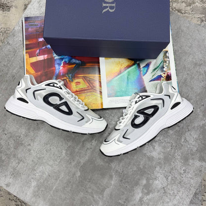 White-and-black B-22 futures sneakers with bold logo and thick outsole