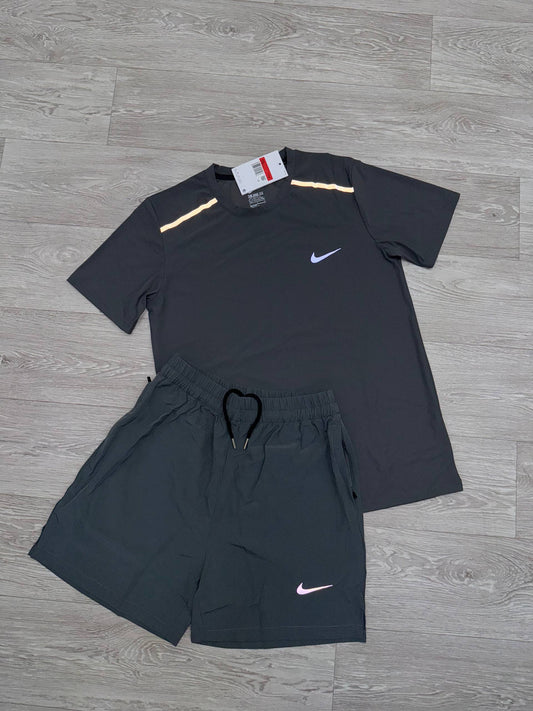 Nike running t-shirt and shorts set with contrasting trim and Nike swooshes on both pieces