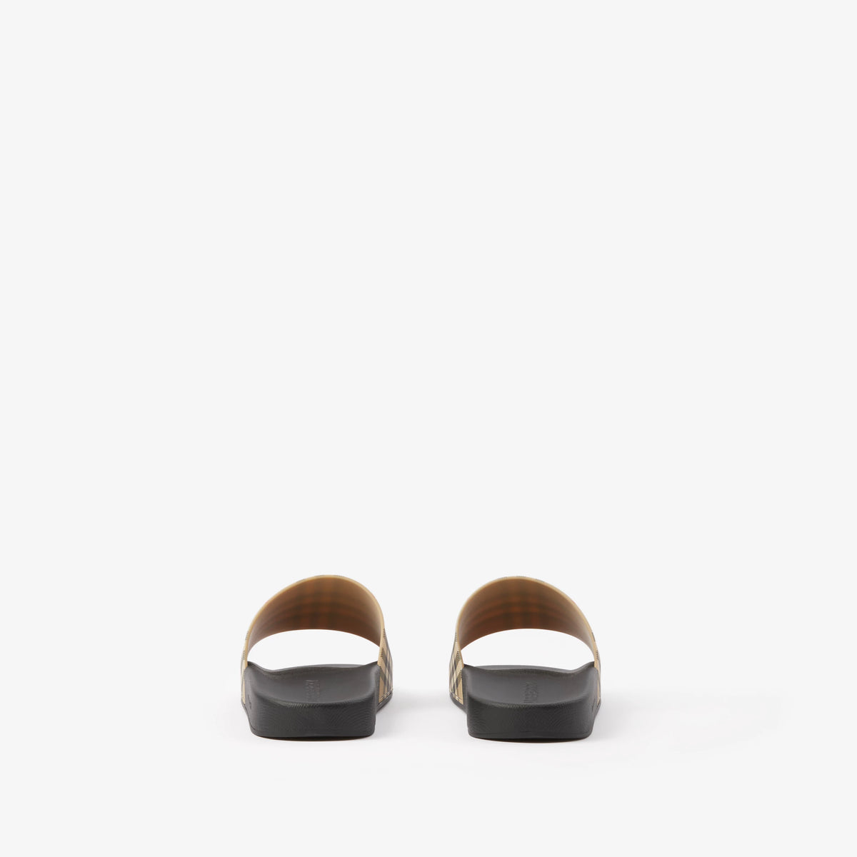 Beige check slides, rear view: black footbed and open heel