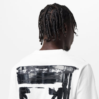 Back of off-white T-shirt close-up: black ink arrow graphic