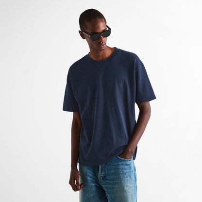 Navy Saint Laurent crew-neck T-shirt with small chest logo on model