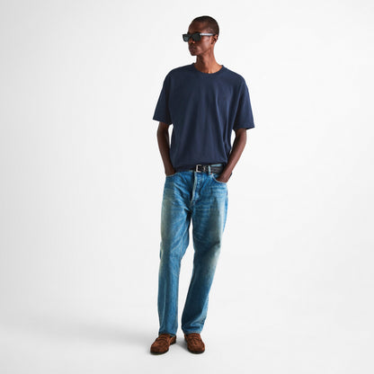 Navy Saint Laurent crew-neck T-shirt with short sleeves on model