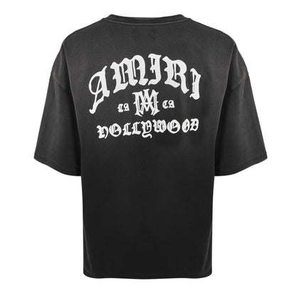 Oversized black T-shirt, large white graphic text print on back