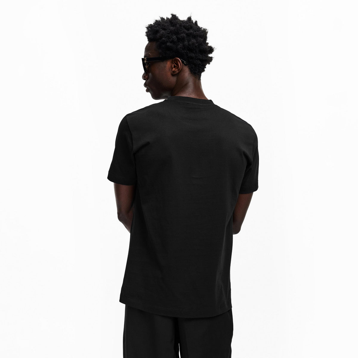 Black short-sleeve T-shirt with crew neck, plain back view