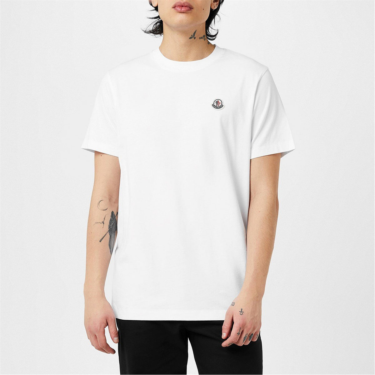 White cotton T-shirt with small chest logo badge and crew neck