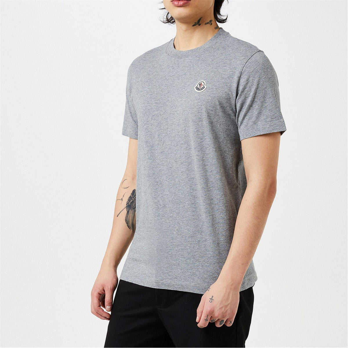 Grey cotton T-shirt with small chest logo badge and crew neck
