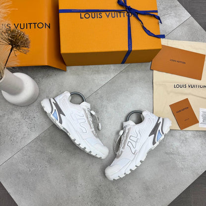 White 4LV trainer sneakers with grey accents and blue trim, lace-up style.