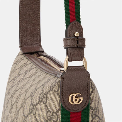 Close-up of brown leather strap and GG-pattern body with green/red web detail