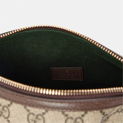 Mini hobo bag interior lining with leather brand patch and gold zipper trim