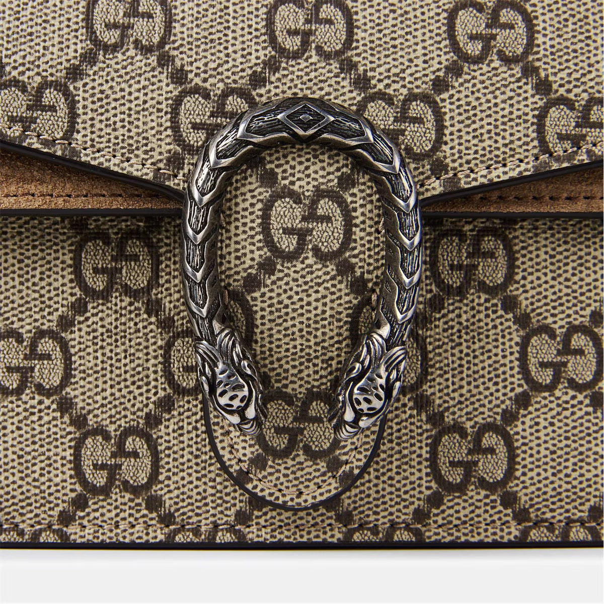 Dionysus GG Supreme Super Mini Bag light brown close-up of oval tiger-head clasp