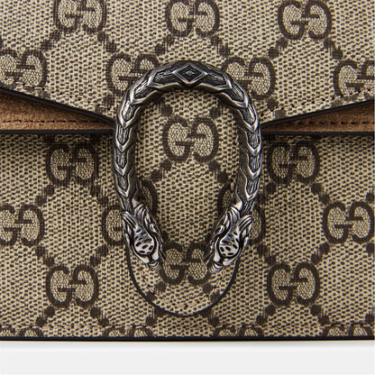 Dionysus GG Supreme Super Mini Bag light brown close-up of oval tiger-head clasp