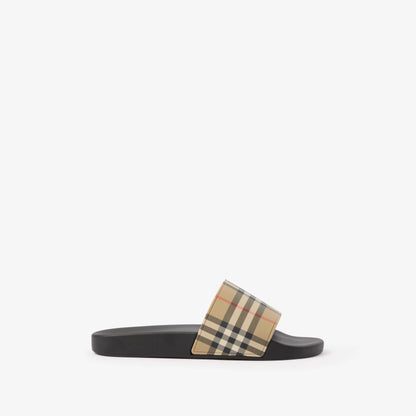 Beige check slides in side profile; black base with branded footbed
