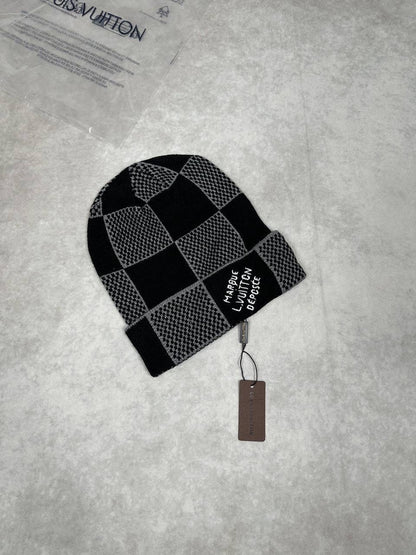 LV black and light gray checkerboard knit beanie with embroidered patch and hang tag