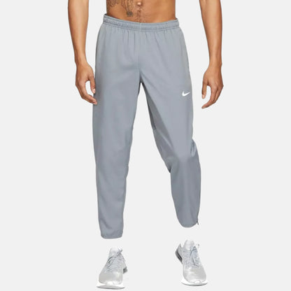 Nike Miler Repel tracksuit pants with elastic waist and Nike logo, light blue