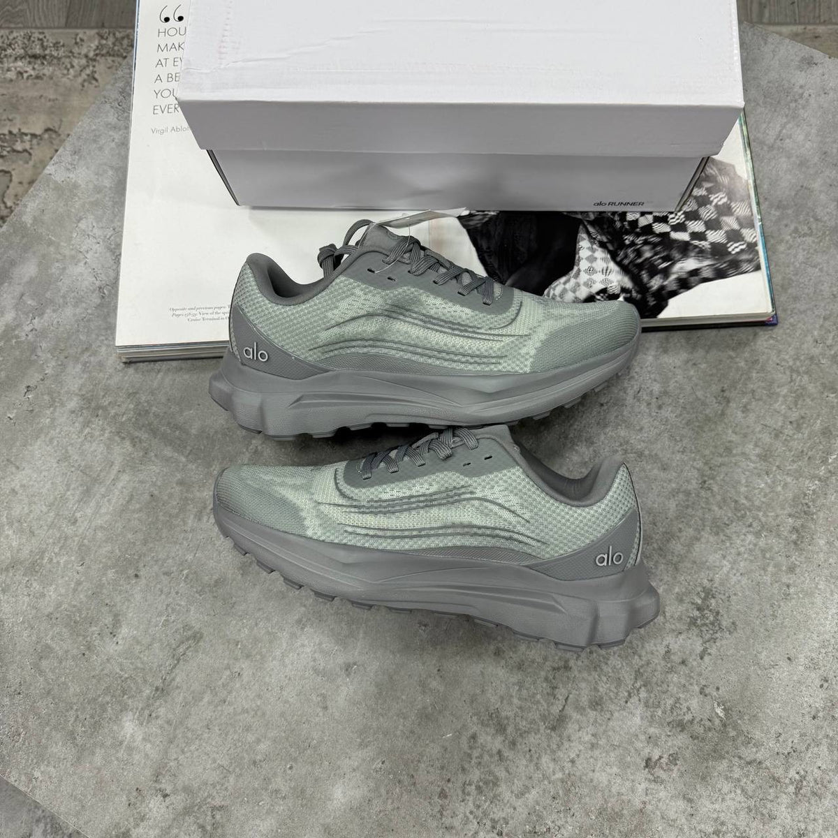 Green lace-up training sneakers with textured upper and thick rubber tread sole