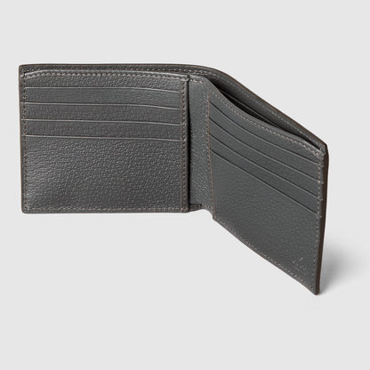 Open grey bi-fold wallet interior: left card slots, right fold pocket