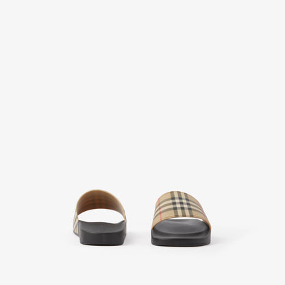 Beige check slides with black sole and white thong strap