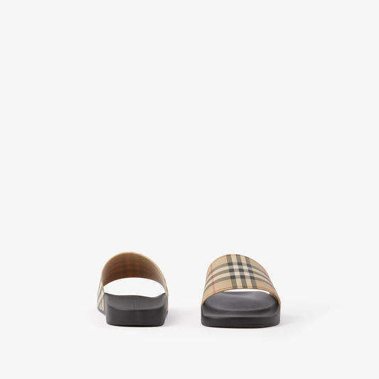 Beige check slides with black sole and white thong strap