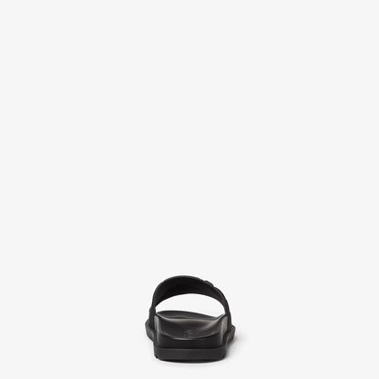 Black rubber slides from the back, open-toe with contoured footbed